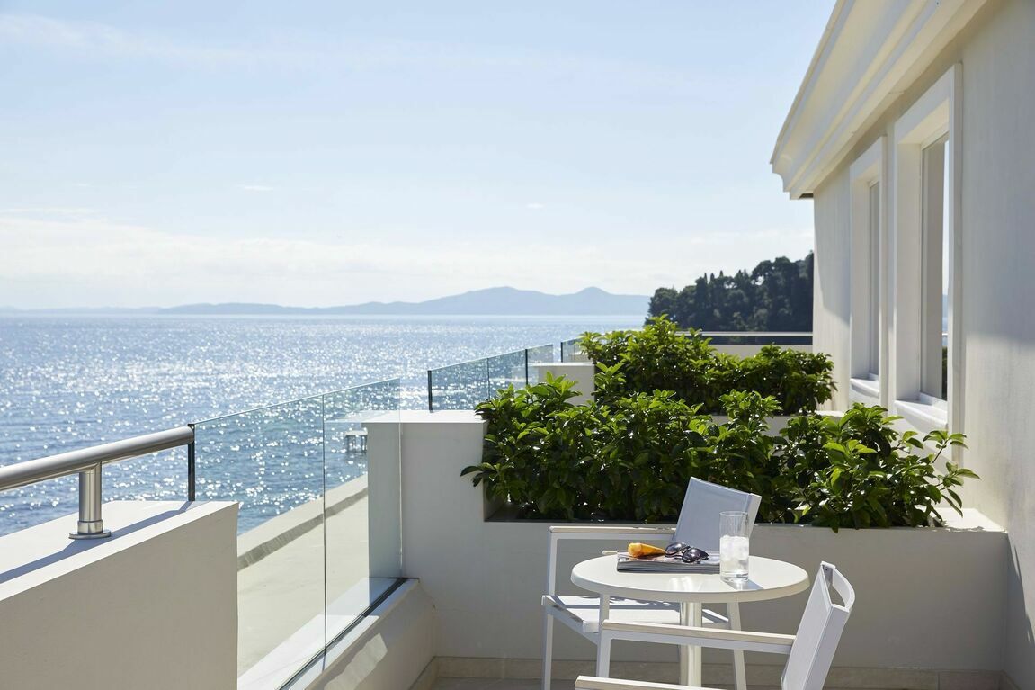 A glorious morning begins on the sea view balcony of Mon Repos Palace, an adults-only hotel in Corfu